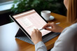 © A10zon Studio - Woman's hands writing on the document of tablet mockup with digital planner on screen, soft tones, photorealistic
