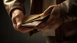 Hands of a man reaching into his open wallet to retrieve a specific card, depicting a moment of financial decision-making. 