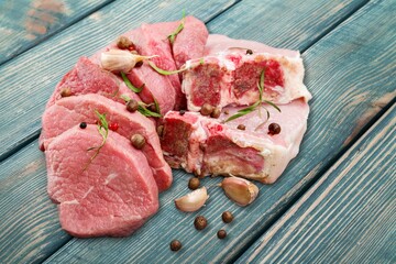 Raw fresh beef steak with herbs