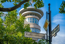 View of sign and building on the tree lined Kurfurstendam in Berlin, Germany