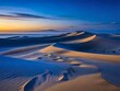 La playa de dunas al atardecer es un lugar de contrastes los azules fríos del océano contra los tonos cálidos de la arena