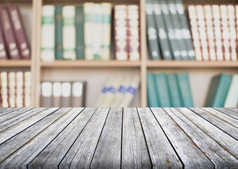 Canvas Print - Wooden empty desk on library with bookshelf background