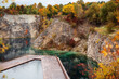 Popular touristic location Zakrzówek Quarry, Krakow. Floating swimming pool with clean blue water and high rocks. Cloudy autumn day