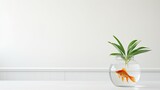 Fototapeta Storczyk - a small goldfish aquarium placed on a wooden table in a well-lit living room with white walls, showcasing a clean and uncluttered design.
