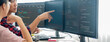 © Summit Art Creations - Cropped image of professional programer team collaboration discuss about web coding while coworker point java script displayed on computer at modern company office. Closeup. Burgeoning.