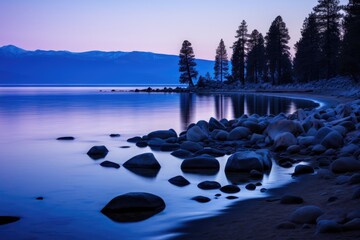 Wall Mural - dusk casting a blue haze over the lake