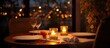 © AkuAku - Candles and food decorate a table for a cozy evening dinner