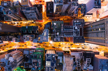 Wall Mural - Aerial top view of downtown district buildings in night city light