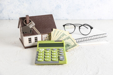 Poster - House model, key, money and calculator on white table