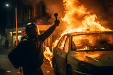 Rioter Throwing A Molotov Cocktail At A Police Car