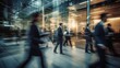 © Twinny B Studio - Business people walking at the modern hall on the window background indoors. long exposure image technic with motion blurred people