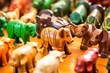 macro image of finely carved wooden toy animals