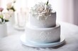a beautiful wedding cake with decorative icing