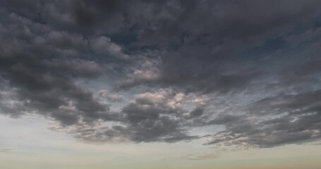 timelapse dark storm clouds dramatic black sky background. dark clouds before thunder storm coming. 