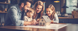 Fototapeta  - Family planning to buy a new house and choosing project according blueprint.