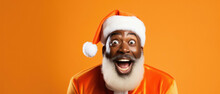 Excited African American Man In Christmas Hat On Orange Background