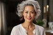 Mature Asian woman portrait. Smiling adult female model. Skincare and beauty treatment concept