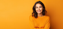 Autumn Banner With Cute Smiling Model Woman Against Orange Background. Thanksgiving Banner With Copy Space