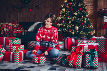 Poster - Photo of lovely young lady open giftbox enjoy morning dressed stylish red sweater christmas tree decorated interior living room