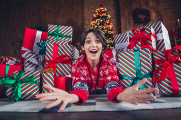 Sticker - Photo of lovely young lady lying floor stretch hands excited dressed stylish red sweater christmas tree decorated interior living room