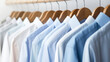 Clean clothes white and blue men's shirts on hangers after dry-cleaning or for sale in the shop. Saling concept. Generated AI