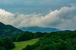 green mountain landscape and cloudy sky