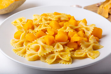 Wall Mural - Pasta with pumpkin. Vegetarian autumn dish.