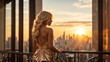 © AMERO MEDIA - Successful beautiful platin blonde russian woman standing on luxury balcony, back view of rich female at sunset in New York city