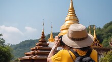  Tourist Take A Photo At Wat Phra That Doi Phra Chan Temple In Lampang Province, Thailand. 