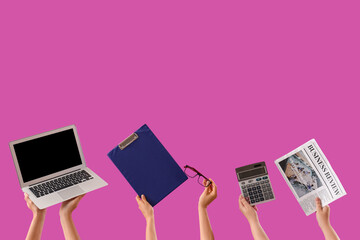 Women with blank laptop, clipboard, eyeglasses, calculator and newspaper on purple background