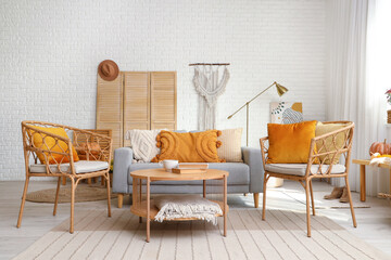 Canvas Print - Interior of stylish living room with armchairs, grey sofa and wooden coffee table