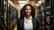 Portrait of Black woman engineer tech in computer server room