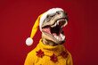 Dinosaur predator with open mouth wearing yellow Christmas hat and smiling. Bright red studio background. Xmas New Year event celebration concept. Close-up portrait of an anatomical skeleton head