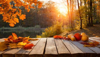 Wall Mural - autumn table orange leaves and wooden plank at sunset in forest
