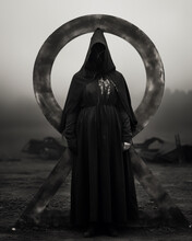 A Dark Atmospheric Portrayal Of A Hooded Figure Standing In Front Of A Large Circular Emblem In A Foggy Landscape. Generative AI.