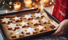 Overhead View Of Christmas Star Shaped Cookies Being Prepared In A Festive Kitchen