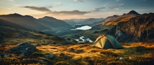 A Picturesque Outdoor Camping Photograph Featuring A Tent Set Amid Untouched Natural Beauty In A Protected Area.