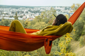 Canvas Print - chilling woman laying down in hammock