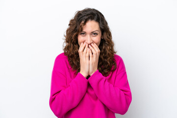 Wall Mural - Young caucasian woman isolated on white background happy and smiling covering mouth with hands