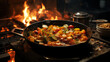 Vegetable Ratatouille in frying pan on a wooden table.