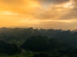 Aerial view of Thung mountain in Tra Linh, Cao Bang province, Vietnam with lake, cloudy, nature.