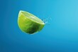 A lime falls from the sky and plummets into a body of water, leaving a splash in its wake