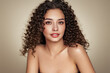 © Oleg Gekman - Fashion studio portrait of beautiful smiling woman with afro curls hairstyle. Fashion and beauty
