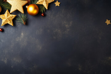 Wall Mural - christmas greeting card. golden baubles and star on black background. copy space. top view. flat lay