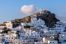 Panoramic View Of The Beautiful Whitewashed Village Of Ios In Greece, Also Known As Chora