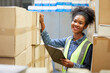 © offsuperphoto - factory worker finding and looking cardboard in the warehouse storage