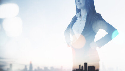 Wall Mural - Young european businesswoman standing on abstract bokeh city background with light mock up place. Success, career development and tomorrow concept. Double exposure.