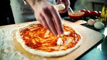 Chef Making Italian Pizza With Mozzarella Cheeze