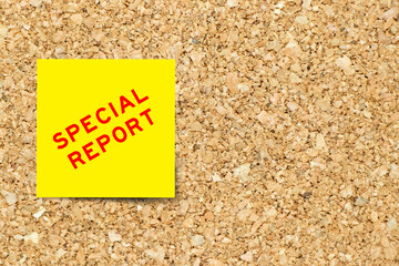 Sticker - Yellow note paper with word report on cork board background with copy space