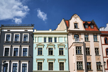 Poster - facades of a historic tenement houses in the city of Torun